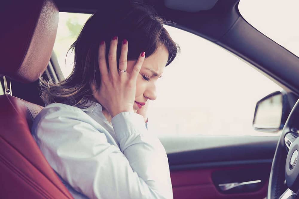 woman in bmw stressed