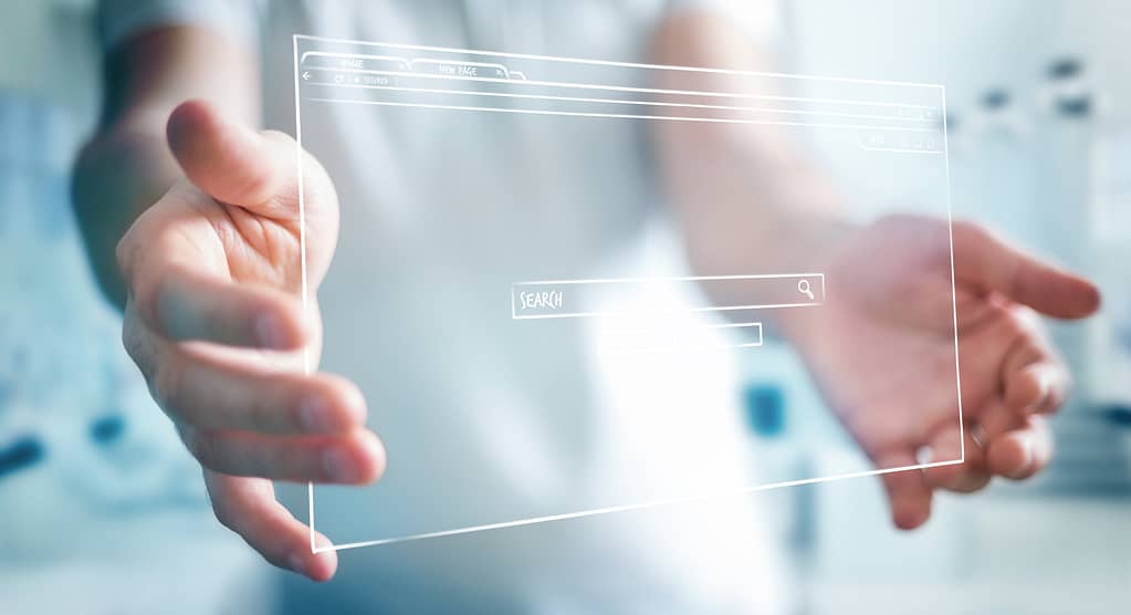 SEO-focused business professional holding ideal web page.
