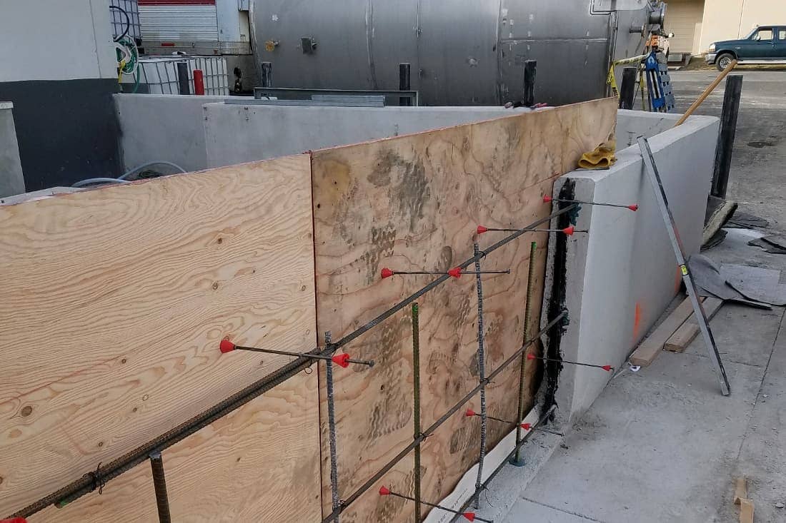 Commercial containment wall repair