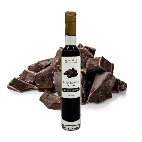 bottle of balsamic in front of dark chocolate chunks