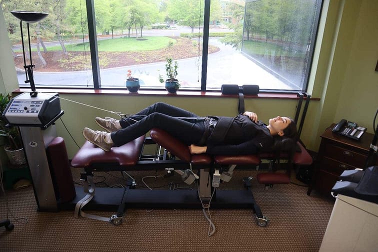 Spinal Decompression | Walker Road Chiropractic Woman tries spinal decompression for a bad back.
