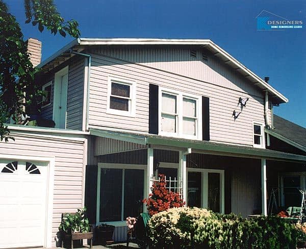 After photo of a two-story home that has been remodled by K-Designers siding and window experts.